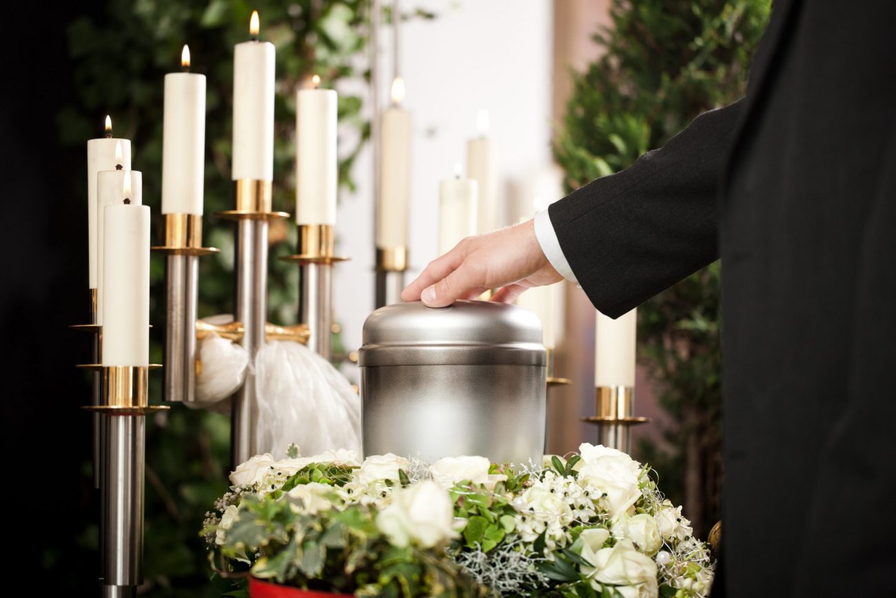 funeral-urn-with-candles-flowers-1-scaled